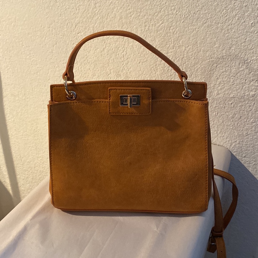 Madison West Crossbody top handle bag cognac color